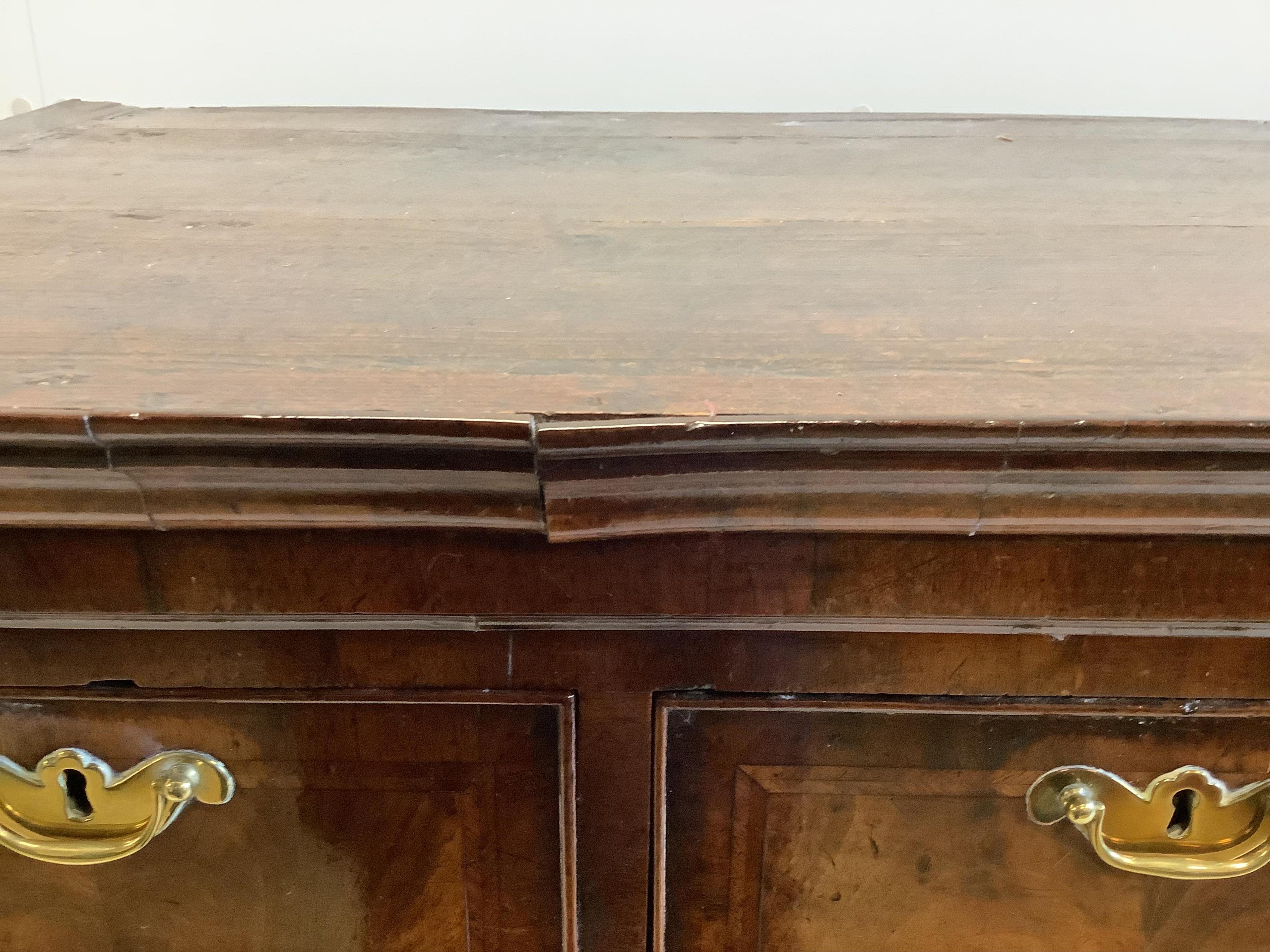 A George II walnut chest on stand, width 104cm, depth 56cm, height 133cm. Condition - fair